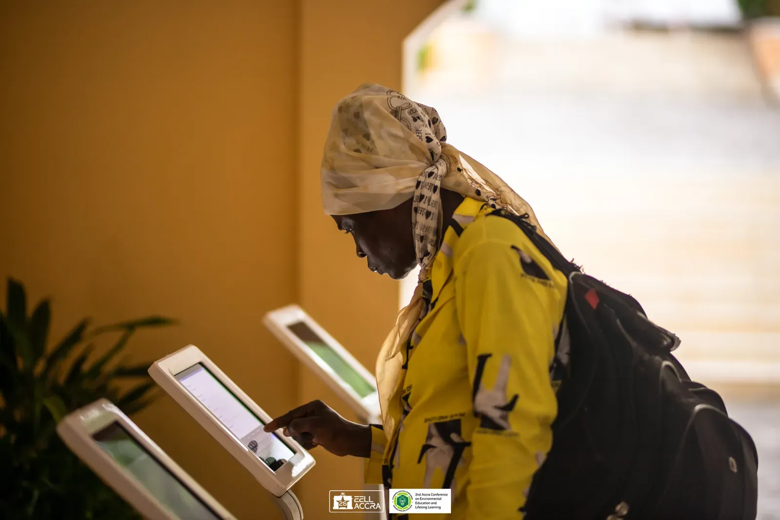 A delegate at the EELL registration desk